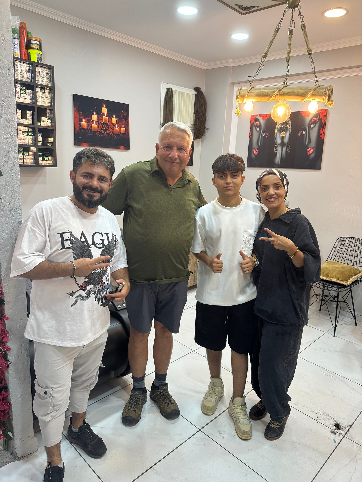 May be an image of 4 people, beard and text