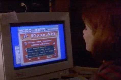A computer displaying a pizza.net online pizza ordering system, and the resulting pizza, in The Net (1995) movie with Sandra Bullock | Film Flavor: A Newsletter Surveying Food in Film