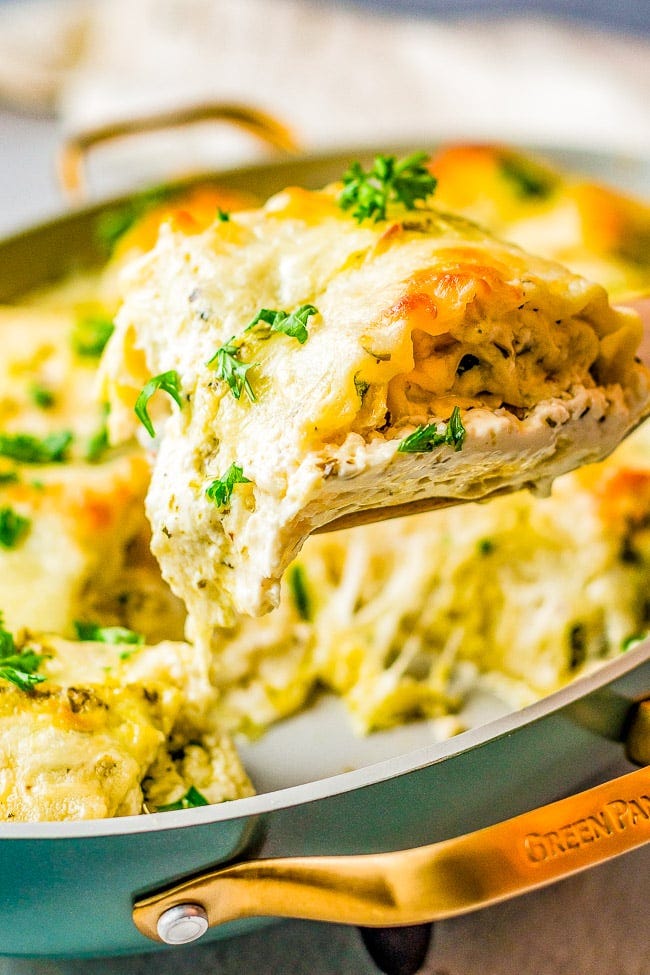 Chicken Alfredo Lasagna Roll Ups — Chicken and bacon combined with spinach and herbs, rolled up in lasagna noodles, and smothered in a homemade three-cheese alfredo sauce! This is the ultimate CREAMY CHEESY COMFORT food recipe that everyone ADORES! Can be prepped in advance and baked off later. Chicken Alfredo Lasagna Roll Ups — Chicken and bacon combined with spinach and herbs, rolled up in lasagna noodles, and smothered in a homemade three-cheese alfredo sauce! This is the ultimate CREAMY CHEESY COMFORT food recipe that everyone ADORES! Can be prepped in advance and baked off later.