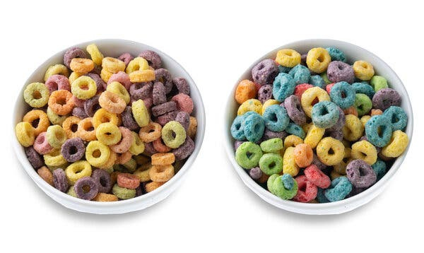 Two bowls of Froot Loops, one with muted purples and orange circles and the other with bright blue, green and yellows. Two bowls of Froot Loops, one with muted purples and orange circles and the other with bright blue, green and yellows.