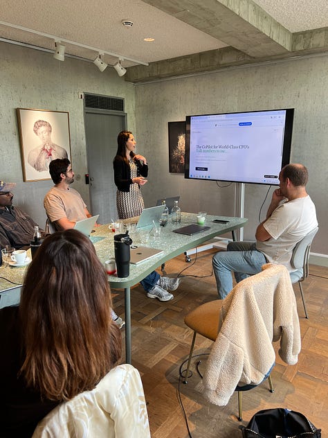 Finance experts during vibe coding workshop