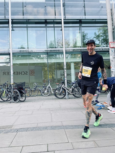 Various photos of the author running the Hannover Marathon