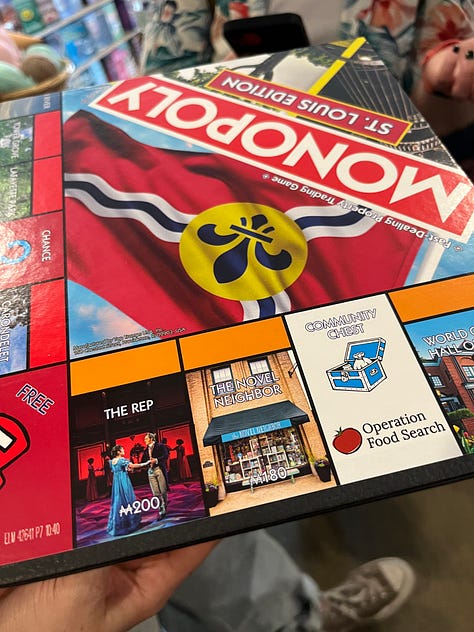 left: exterior of Novel Neighbor; center: Monopoly Board with Novel Neighbor on it; right: red squares on the wall, all signed by authors with keys attached