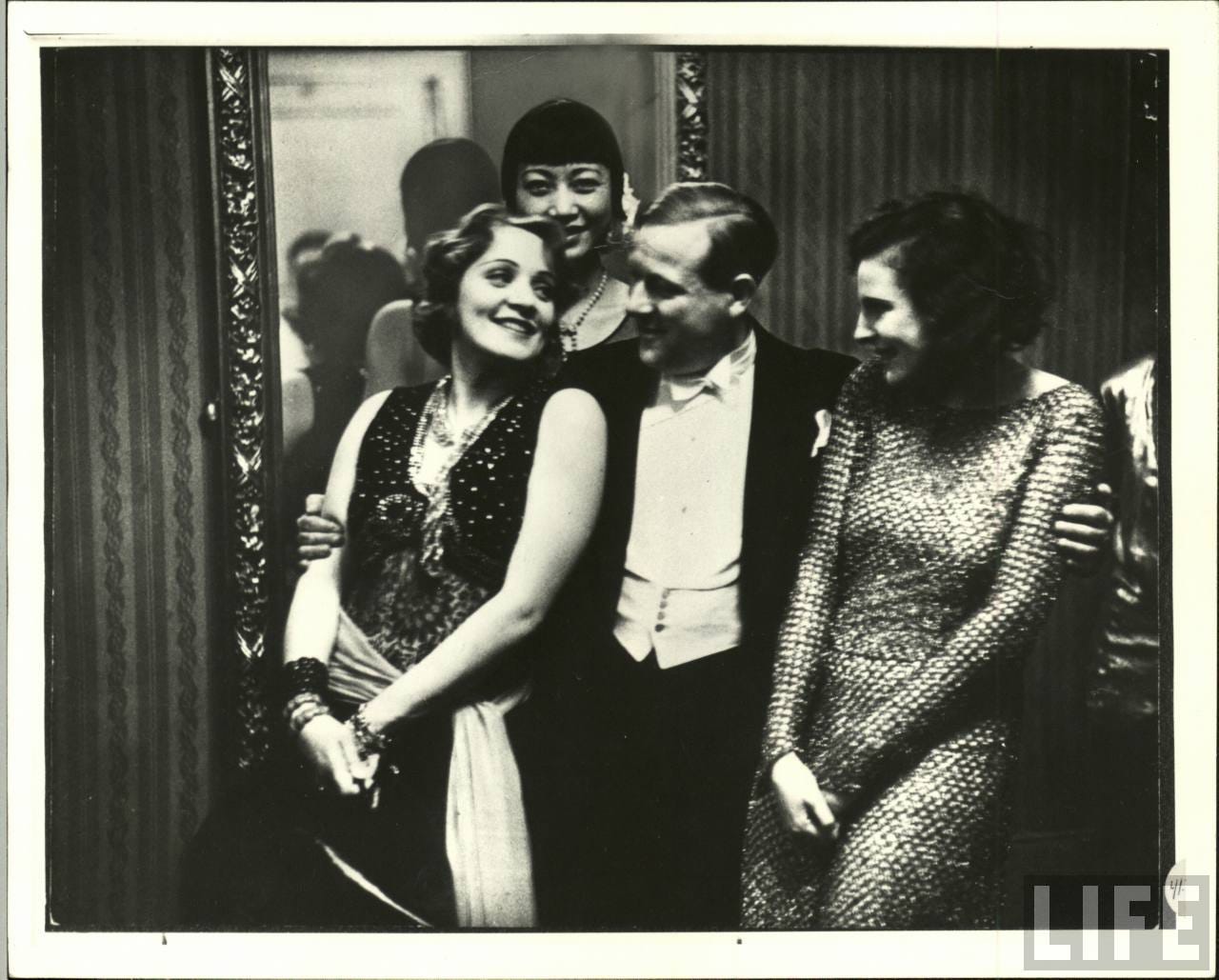 black and white photo of the three women and Richard Eichberg black and white photo of the three women and Richard Eichberg