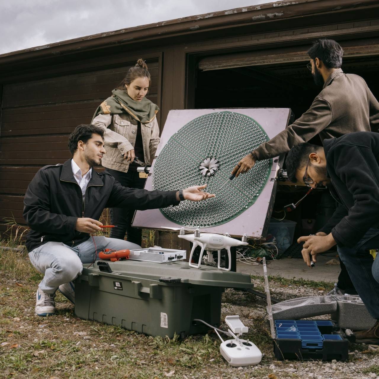 Students developed a drone-destruction system in a backyard using an old car speaker.