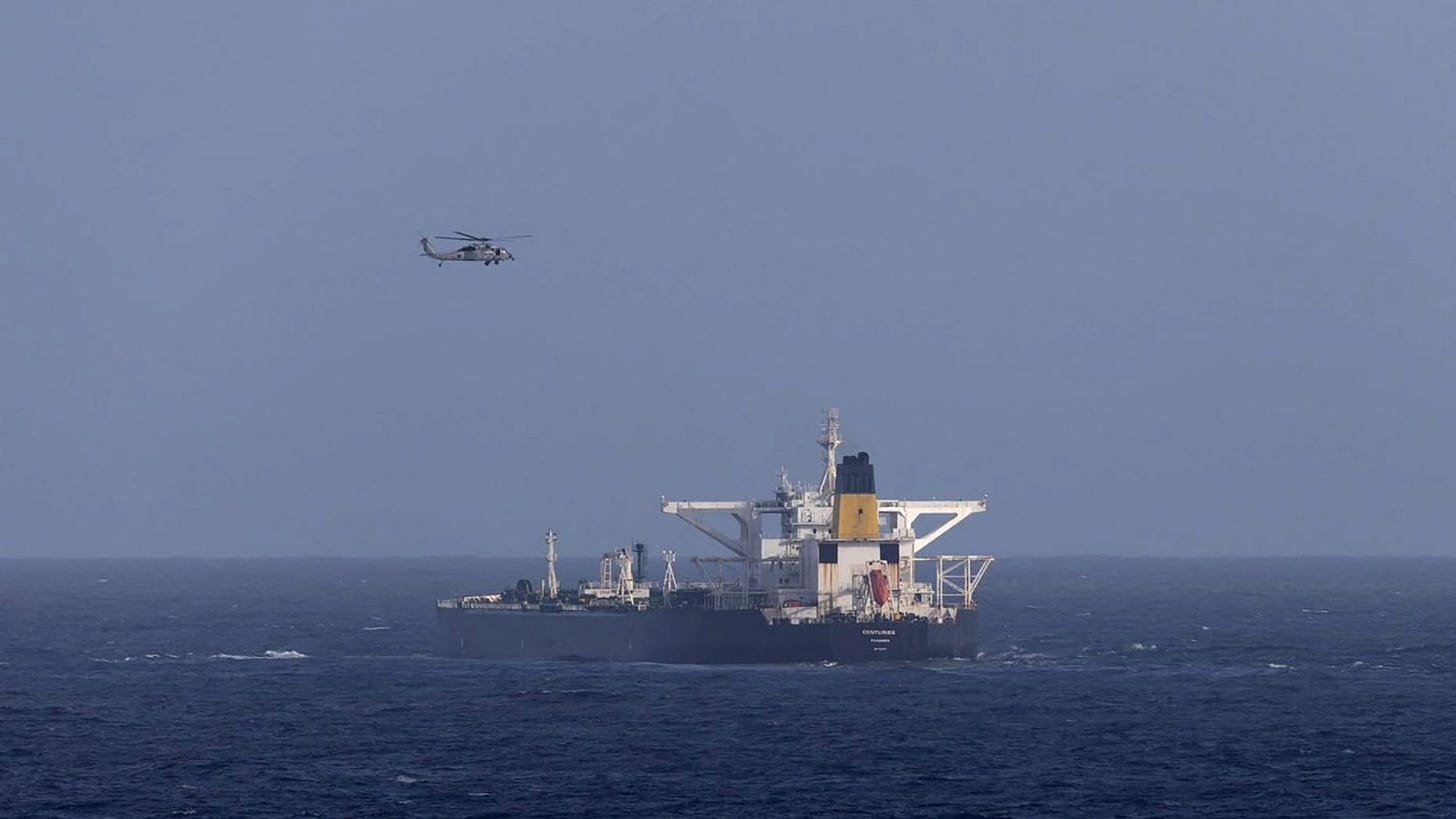 A U.S. military helicopter flies over the Panama-flagged Centuries, which was intercepted by the U.S. Coast Guard, days after U.S. President Donald Trump announced a "blockade" of all sanctioned oil tankers entering and leaving Venezuela, east of Barbados in the Caribbean Sea December 20, 2025. DHS/Handout via REUTERS THIS IMAGE HAS BEEN SUPPLIED BY A THIRD PARTY A U.S. military helicopter flies over the Panama-flagged Centuries, which was intercepted by the U.S. Coast Guard, days after U.S. President Donald Trump announced a "blockade" of all sanctioned oil tankers entering and leaving Venezuela, east of Barbados in the Caribbean Sea December 20, 2025. DHS/Handout via REUTERS THIS IMAGE HAS BEEN SUPPLIED BY A THIRD PARTY