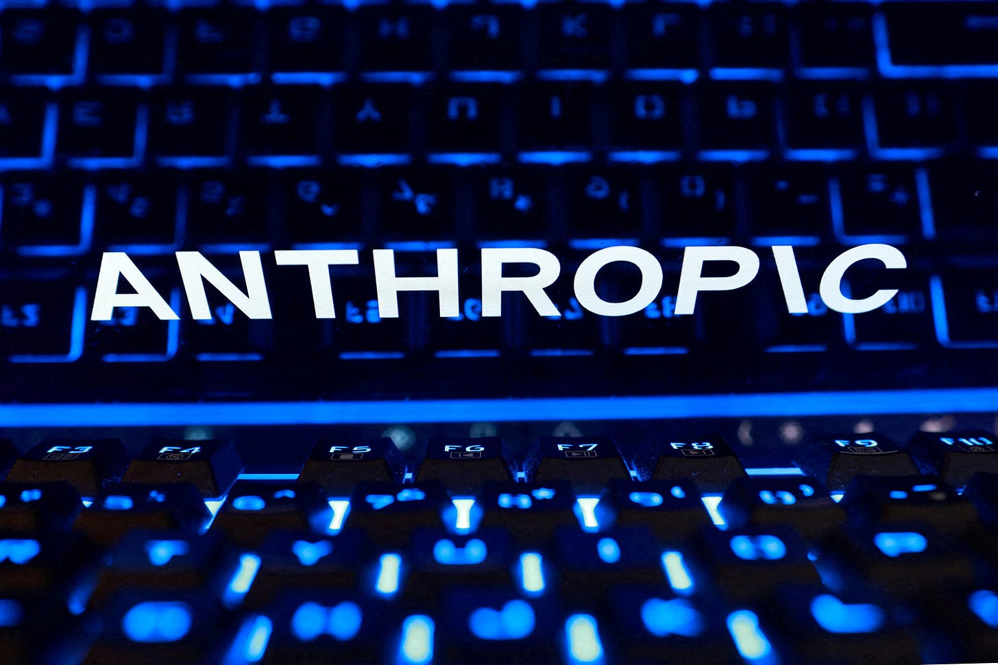 Word ANTHROPIC over a blue backlit keyboard, illustrating Anthropic's IPO filing and net loss Word ANTHROPIC over a blue backlit keyboard, illustrating Anthropic's IPO filing and net loss
