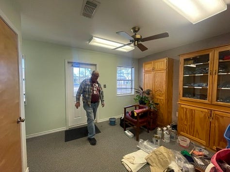 Six photos of the green walls in the office before we got to work painting..