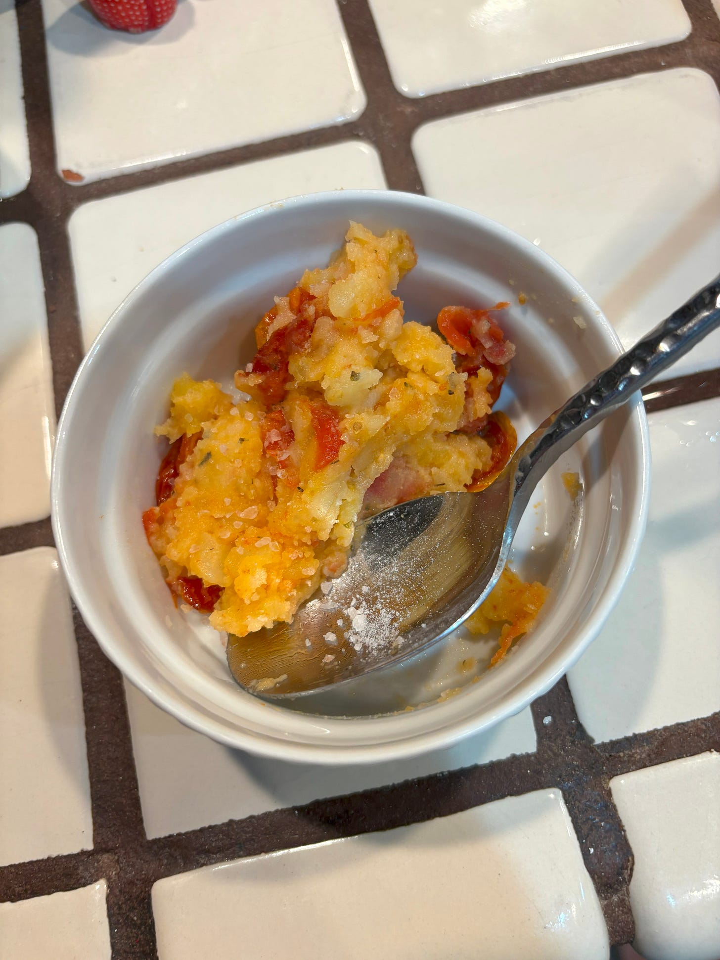 Mashed potatoes with tomatoes thrown in