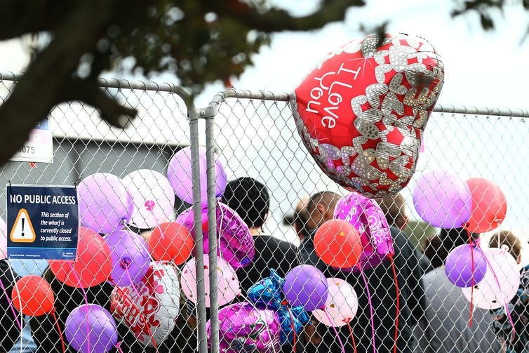 Balloons are seen as family and friends of victims gathered a few days after the White Island eruption. Balloons are seen as family and friends of victims gathered a few days after the White Island eruption.