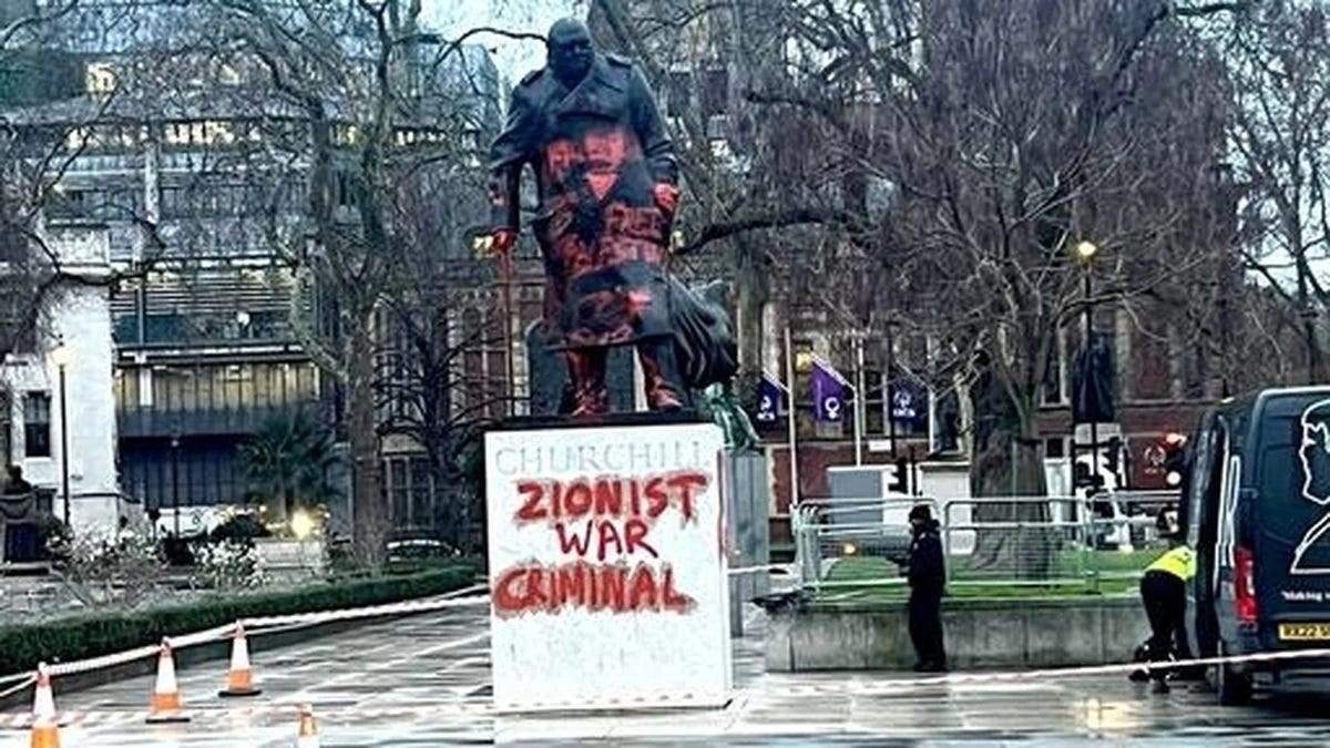 👉 https://bit.ly/3MA3pqP- Churchill's statue in Parliament Square, London, doused in red paint, "Zionist War Criminal" spray-painted across the plinth. Police cordon in place. February 27, 2026. The man responsible flew in from the Netherlands, pre-recorded his own arrest, and was in custody before the paint dried. 👉 https://bit.ly/3MA3pqP- Churchill's statue in Parliament Square, London, doused in red paint, "Zionist War Criminal" spray-painted across the plinth. Police cordon in place. February 27, 2026. The man responsible flew in from the Netherlands, pre-recorded his own arrest, and was in custody before the paint dried.