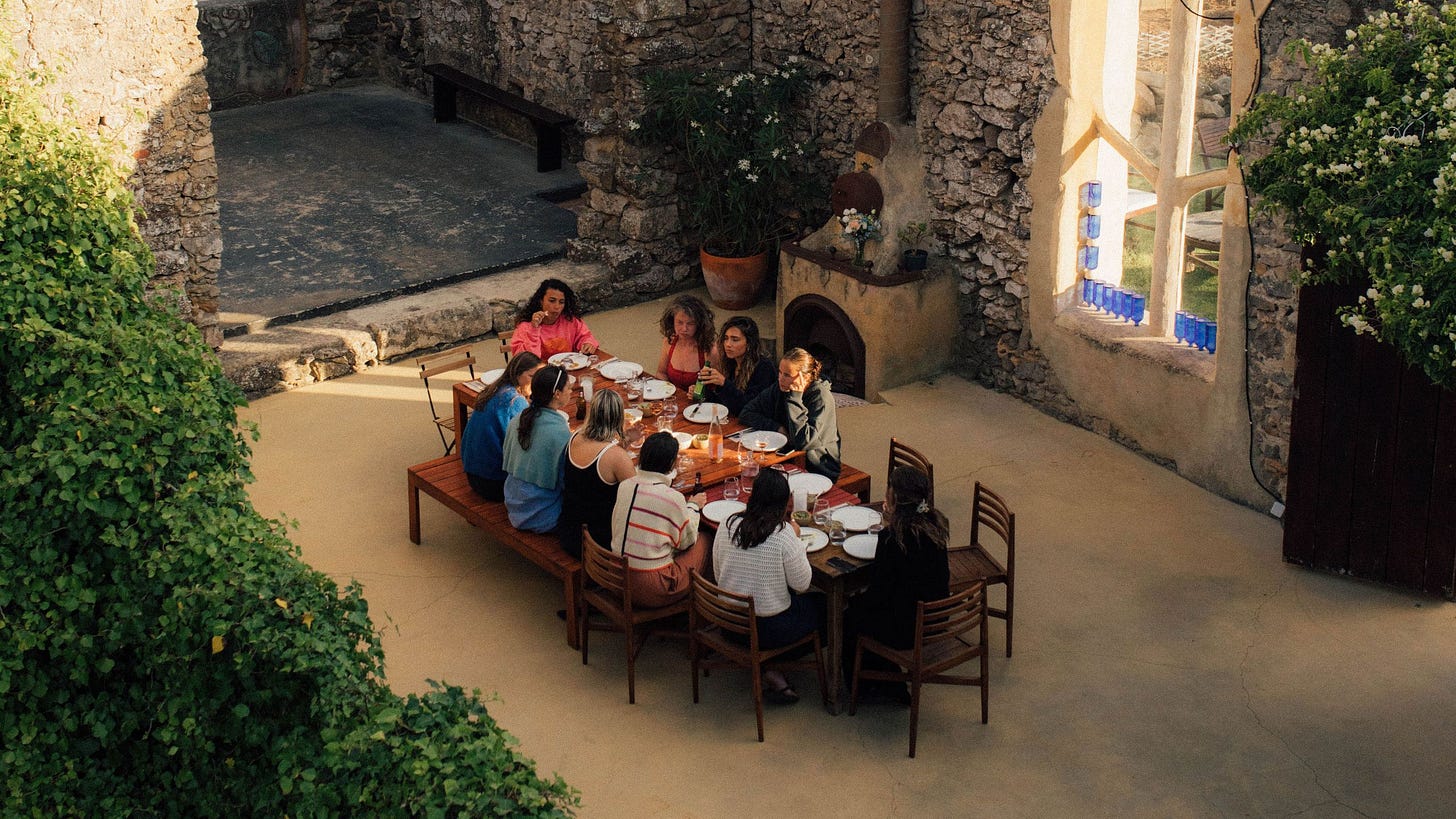 Image may contain Dining Table Furniture Table Plant Potted Plant Architecture Building Dining Room and Indoors