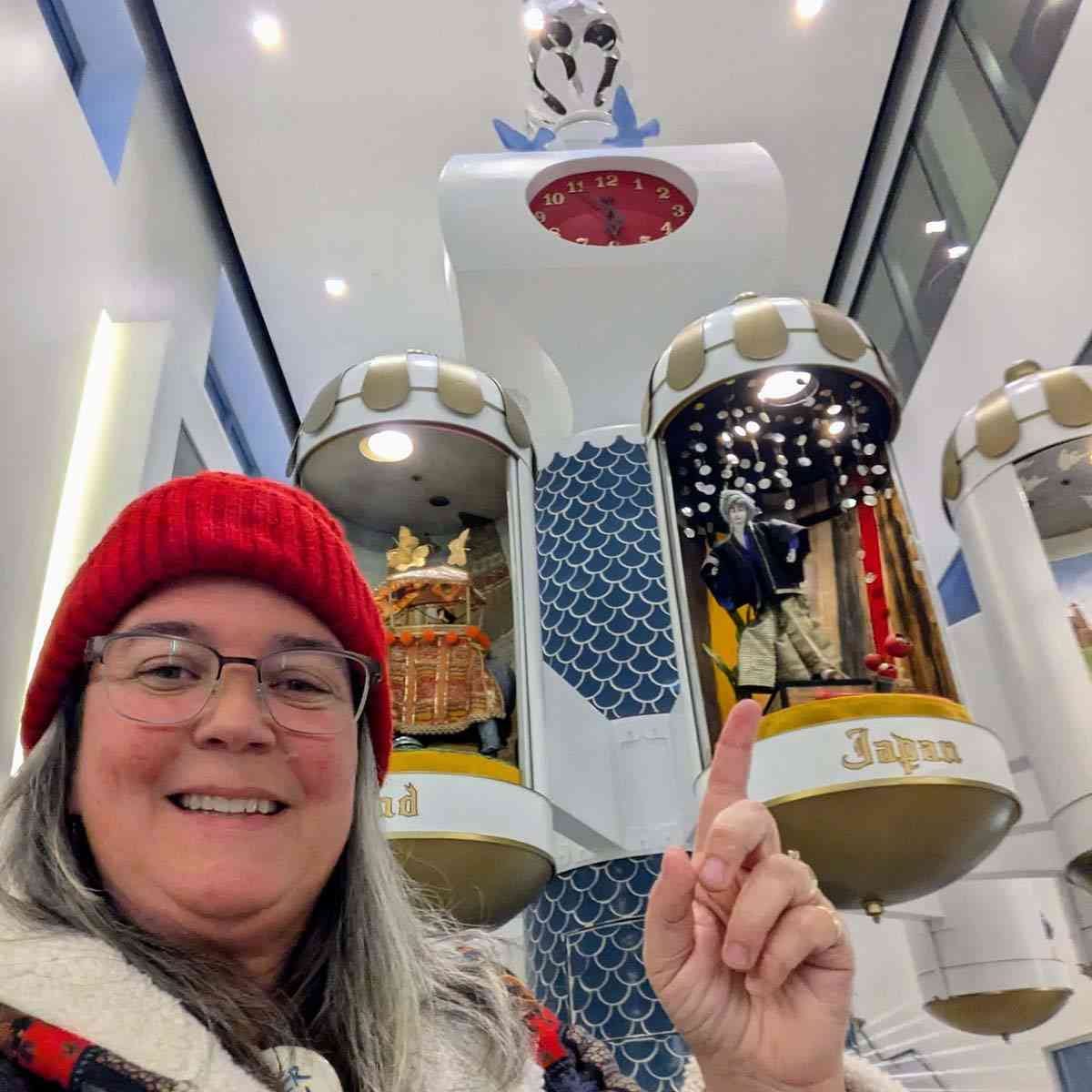 Debi visiting the Clock of Nations