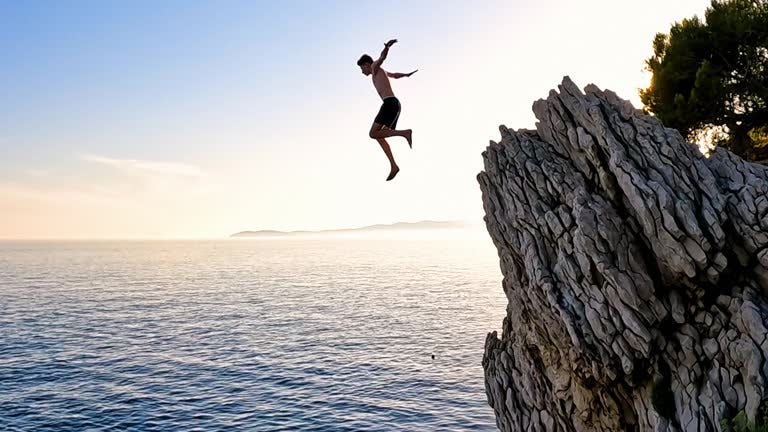 887 Cliff Jumping Stock Videos, Footage, & 4K Video Clips - Getty Images |  Cliff diving, Skydiving, Cliff jumping into water