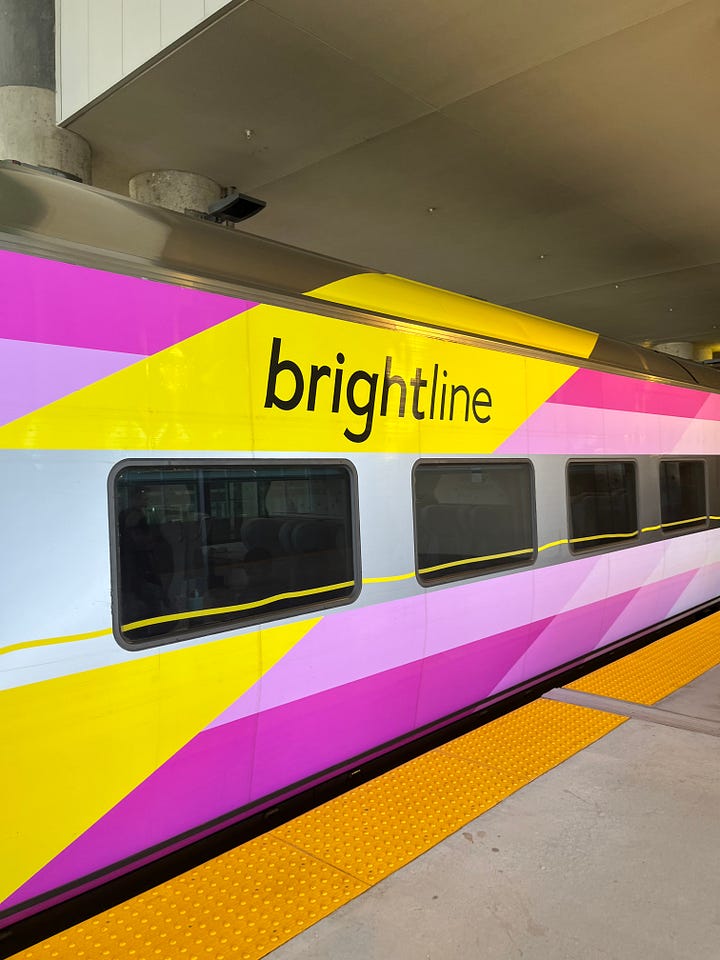 On the left is an image of the yellow-and-pink Brightline train and on the right is an image of the yellow Metromover with the sign above showing the route