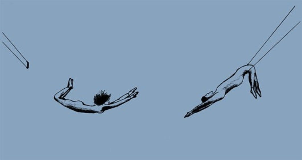 Liminal space: trapeeze artist flying through air, waiting to be caught