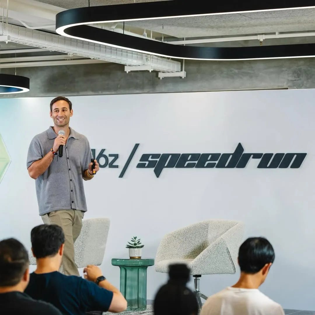 A photo of Taylor Offer speaking at an a16z Speedrun founder session during the 12-week accelerator, where Atrios refined its AI-powered warm introduction platform and rapidly scaled hiring and go-to-market execution.