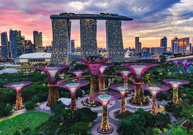 Breathtaking view of the iconic Marina Bay Sands hotel and magical Gardens  by the Bay, SingaporeAmazing shot taken by: @leobunggo