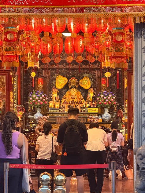 Offerings and prayers at Ciyou Temple