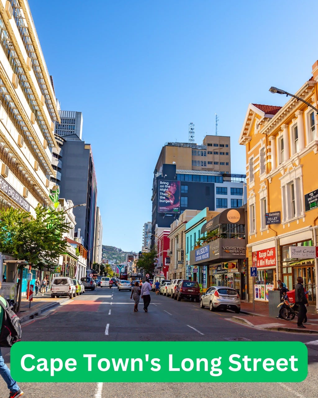 May be an image of 7 people, road, street and text