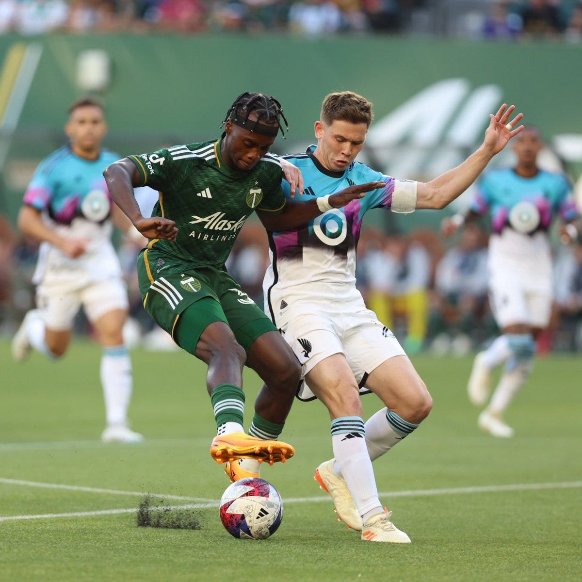 Santi Moreno battles for a ball