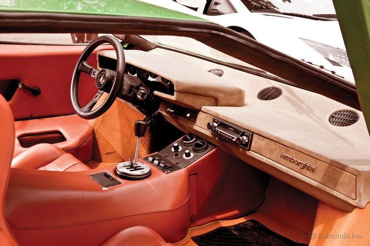This may contain: the interior of an old car with leather seats This may contain: the interior of an old car with leather seats
