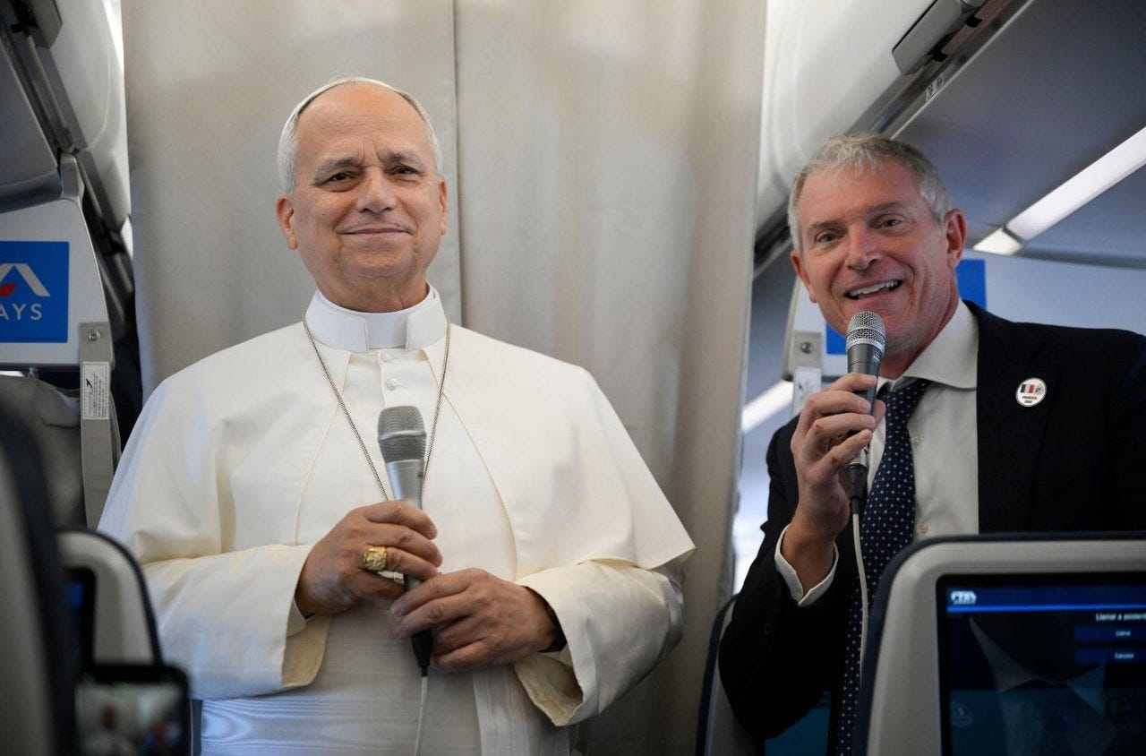 Pope Leo XIV with Matteo Bruni aboard the papal flight