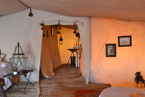 Moments from Dar Ahlam showing the thoughtful hospitality experience - the kasbah grounds, intimate dining spaces, desert excursions, and candlelit dinners that exemplified genuine welcome.