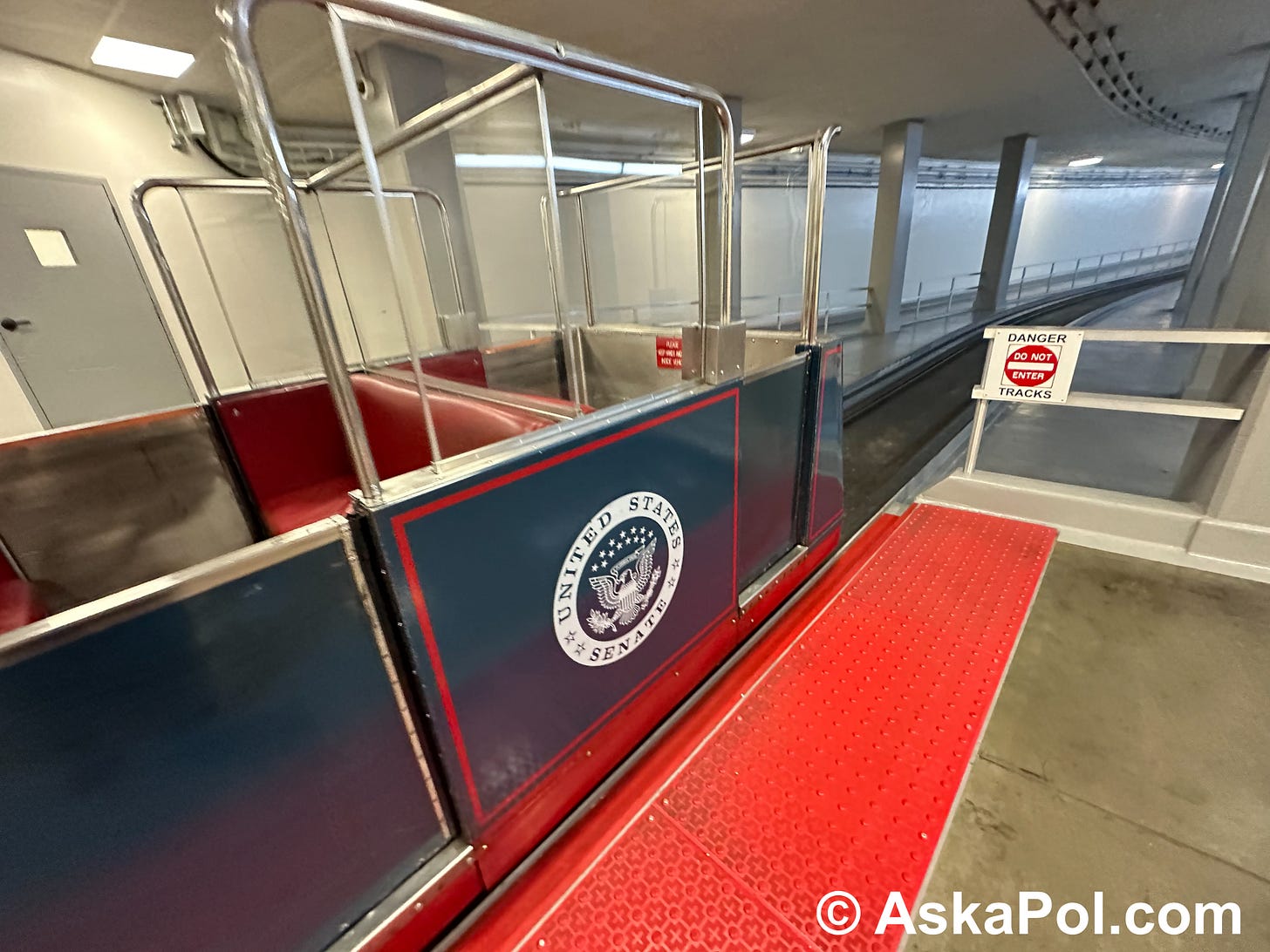 A train car sits empty inside a building Photo: www.mattlaslo.com © Ask a Pol 