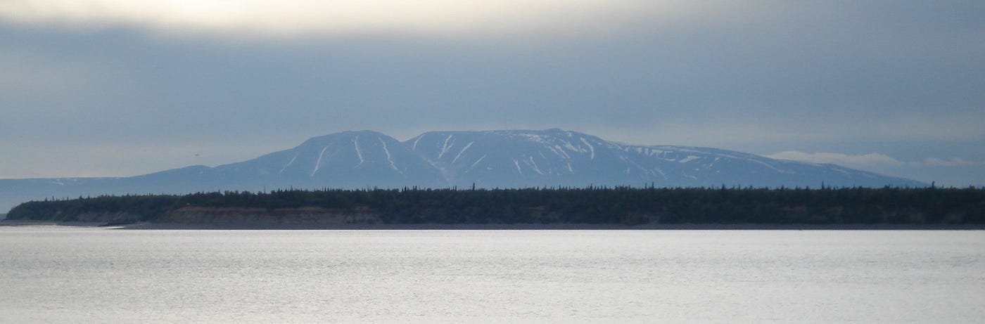 The author pictures Mt. Susitna outside of Anchorage, Alaska.