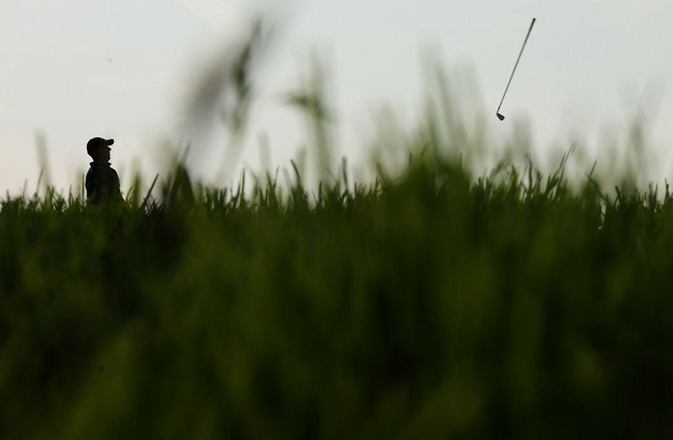 Rory McIlroy throws his club on the 12th hole during the second round of the U.S. OPEN at Oakmont Country Club in Pennsylvania. Photo by Patrick Smith