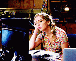 A gif of a blonde woman falling alseep at her desk, a photo of a tabby and white cat curled up sleeping, close up on the nose