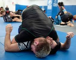 John Danaher - Passing half guard - head control: The final stage of most  forms of guard pass is to get control of the head and shoulder. In most  cases you begin