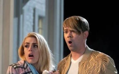 Busy Philipps and Andrew Rannells in character on Girls5Eva