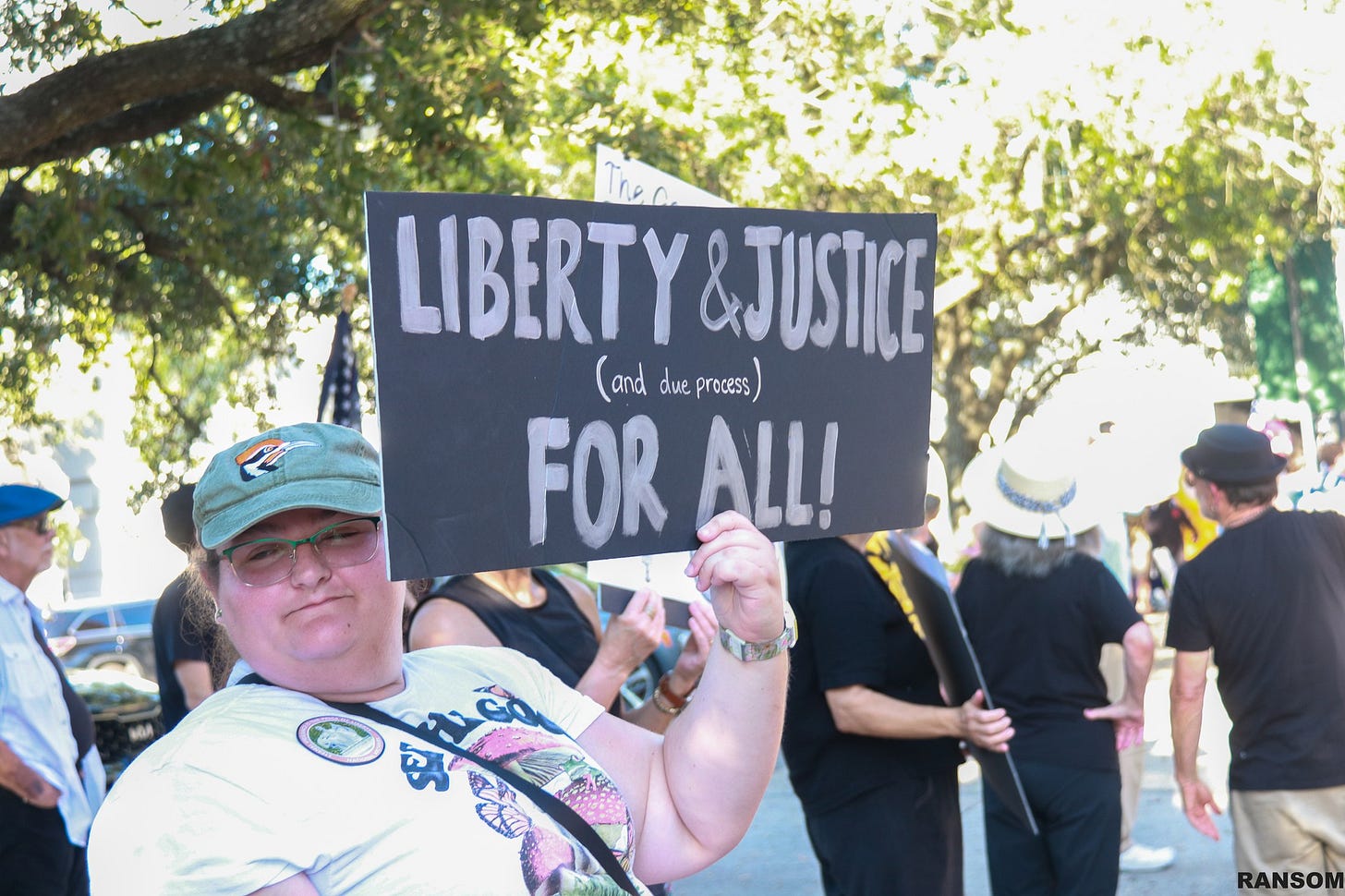 May be an image of text that says 'Tren LIBERTY&JU &JUSTICE (and due process FOR ALL! ชนิต RANSON'