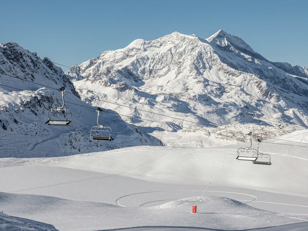 white and black mountains under blue sky during daytime