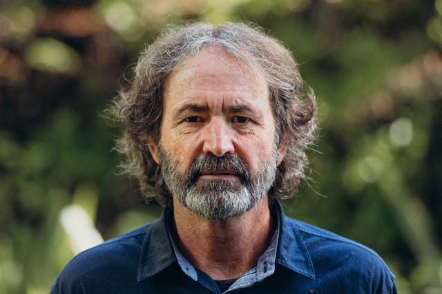 Portrait photo of Mike Joy Portrait photo of Mike Joy