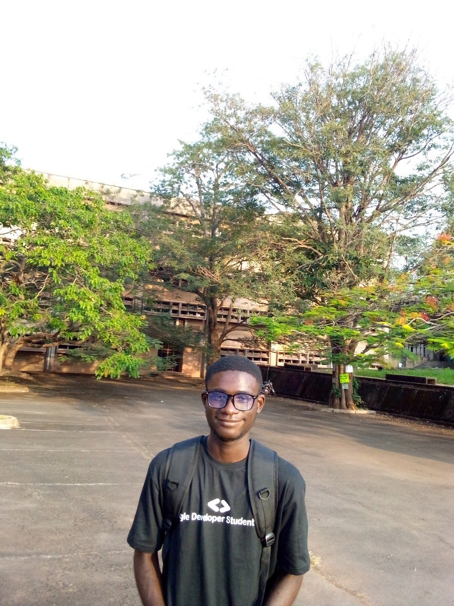 Amazing Enyichi Agu in front of Faculty Building, UNN