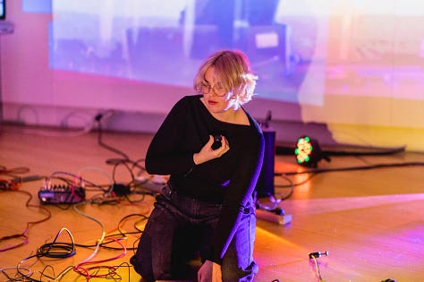 Images of performances in gallery space with artists using various types of sound and projection equipment  