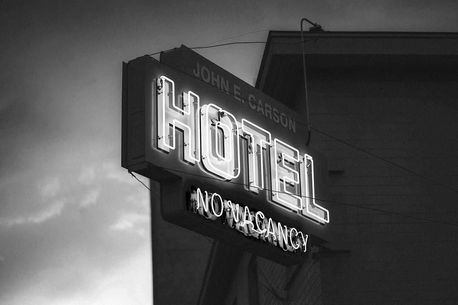 John E. Carson hotel no vacancy neon light signage John E. Carson hotel no vacancy neon light signage