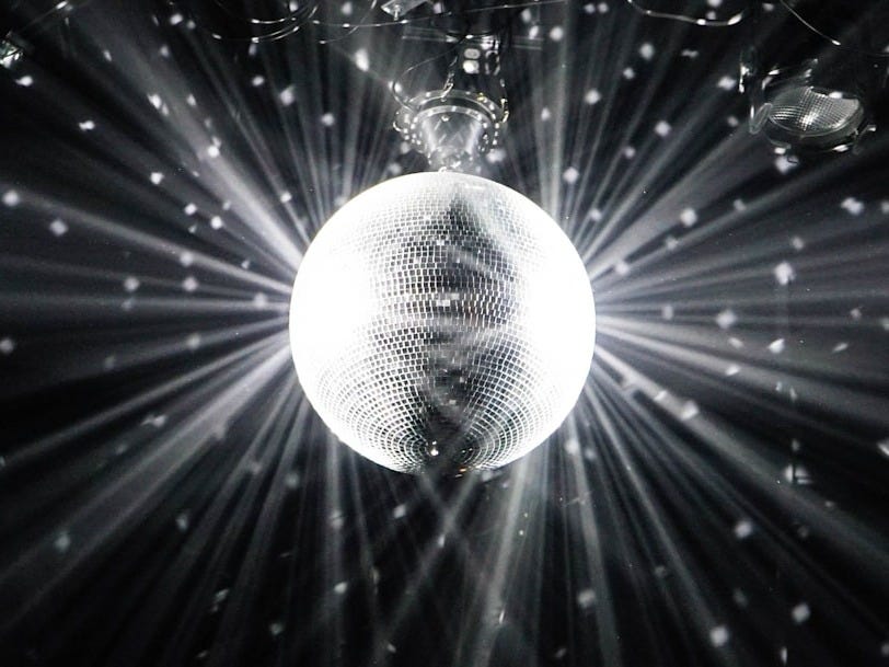 grayscale photography of disco ball