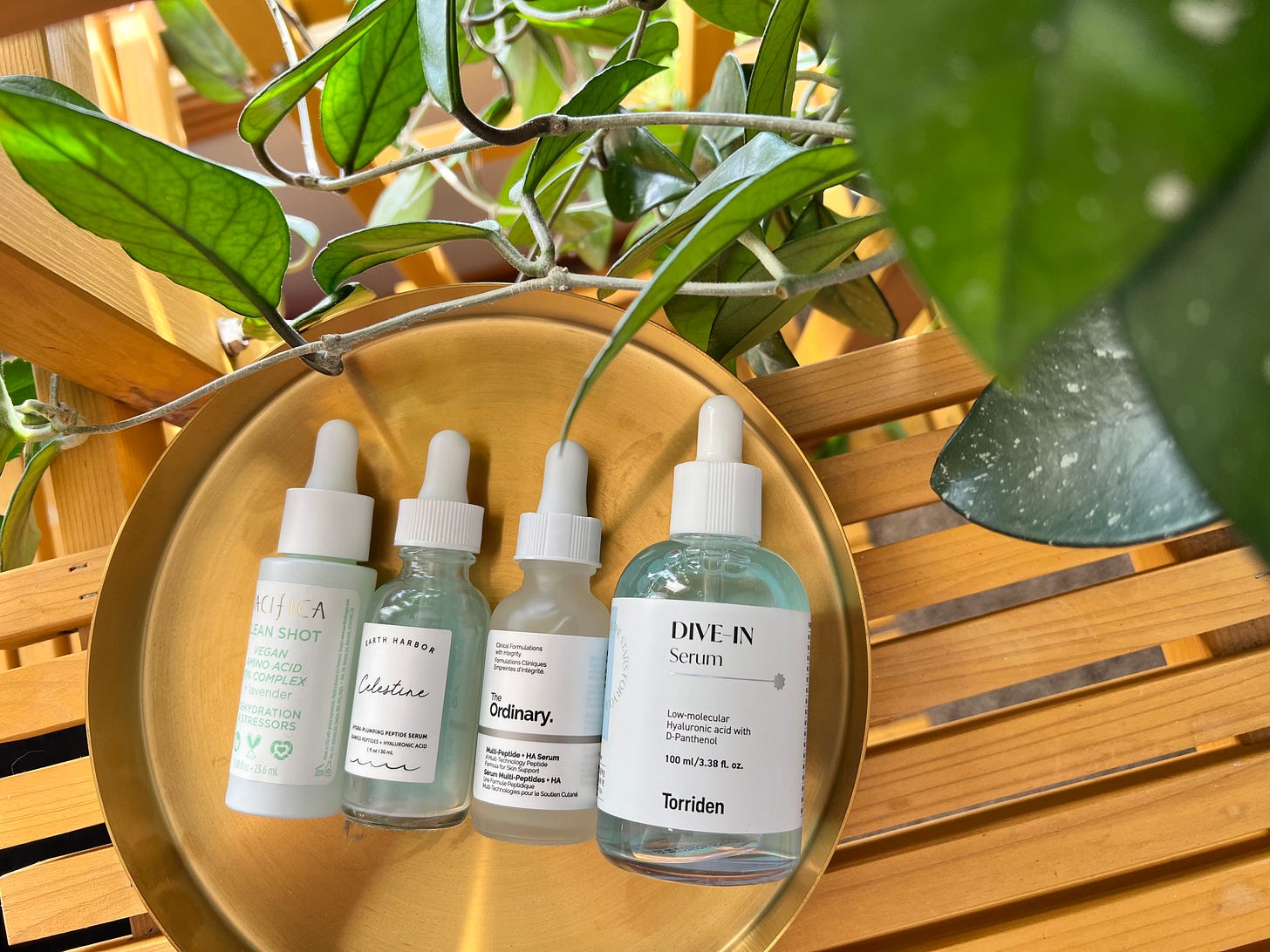 different glass bottles filled with serums that have skincare benefits.