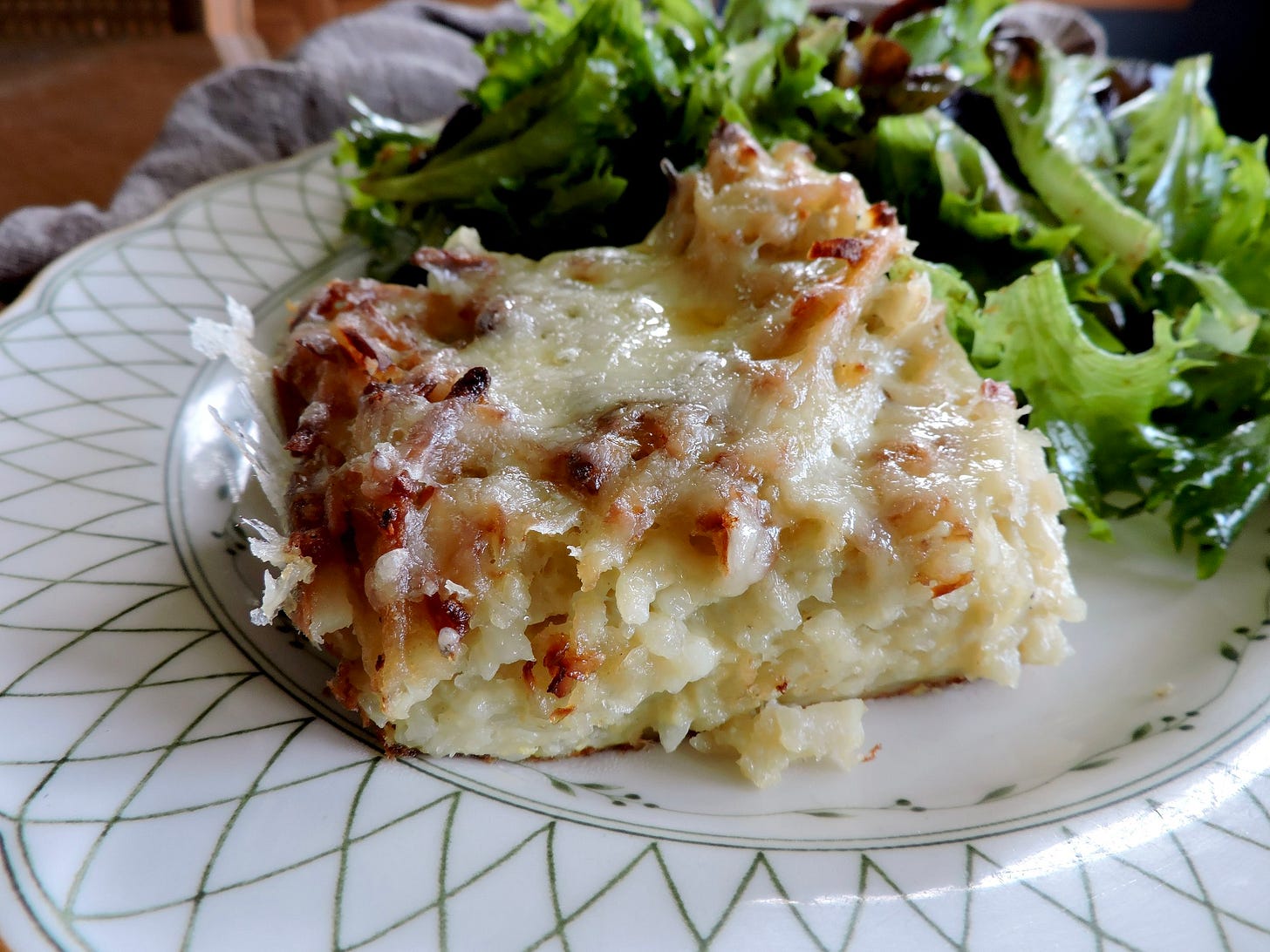 Here, potato kugel with cheesy delight. Here, potato kugel with cheesy delight.