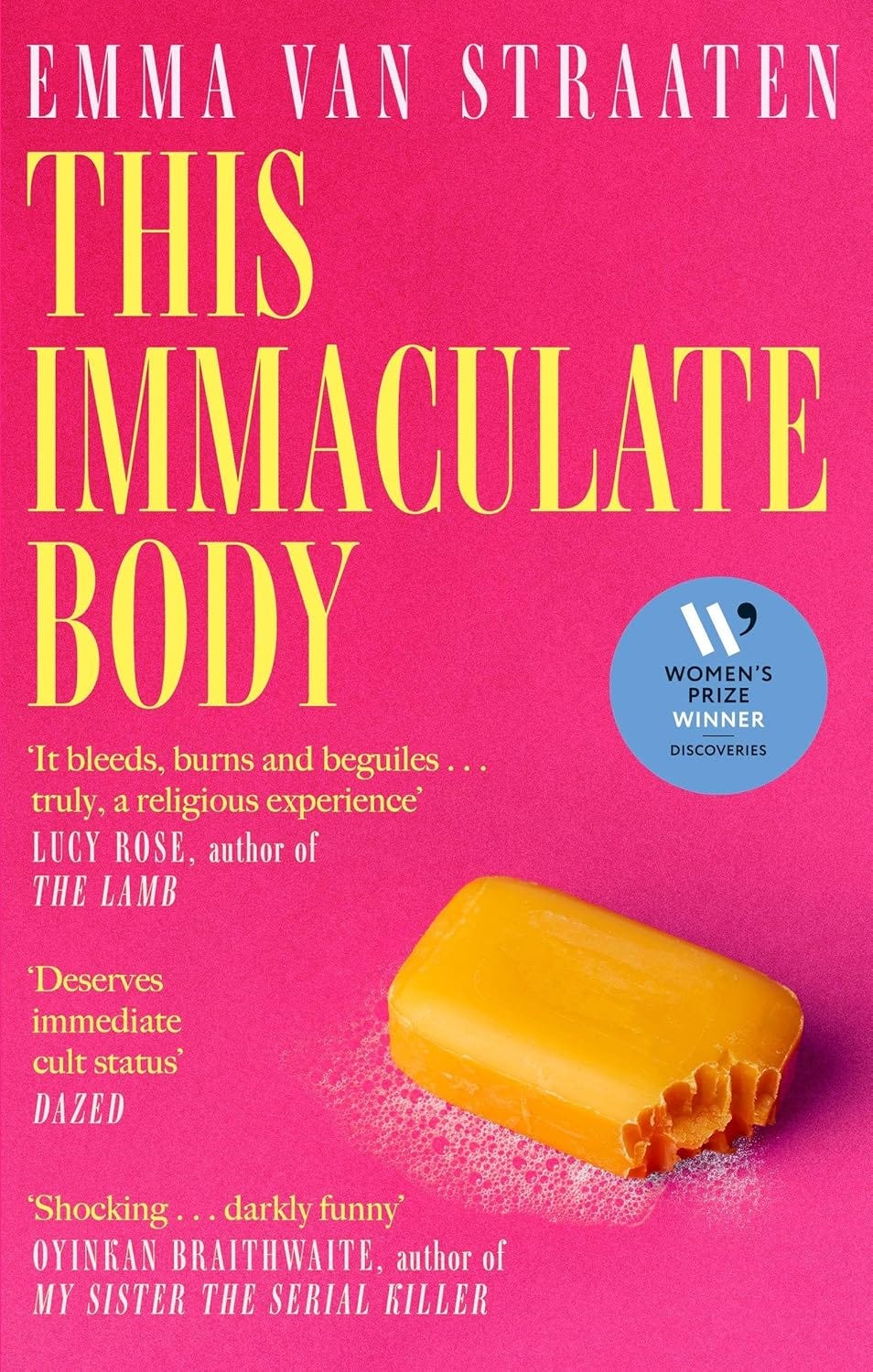 Book cover of This Immaculate Body by Emma van Straaten, featuring bold yellow typography on a bright pink background and an image of a bitten orange bar of soap, with endorsements from Lucy Rose, Dazed, and Oyinkan Braithwaite, and a Women’s Prize Discoveries Winner badge.