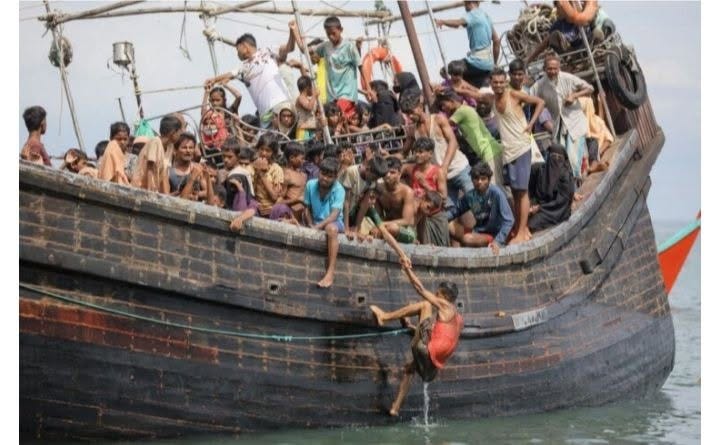 May be an image of one or more people and boat