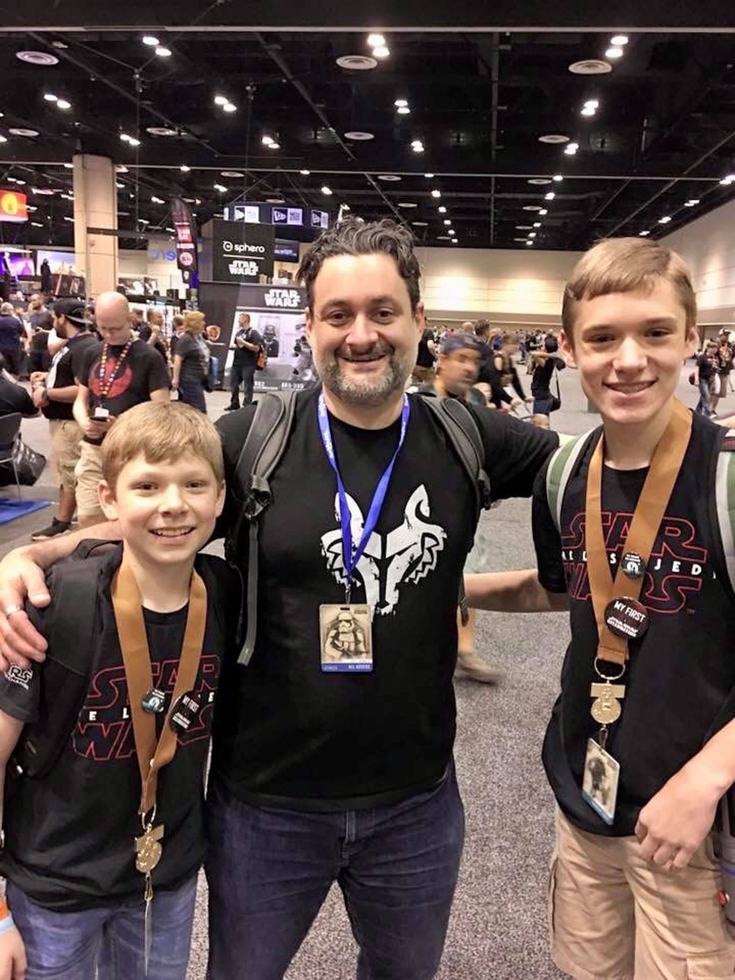 Nate and Sam with Dave Filoni on the show floor of Star Wars Celebration Orlando in 2017 -  Announcement About the Future of Tatooine Sons: A Star Wars Podcast - Tatooine Sons