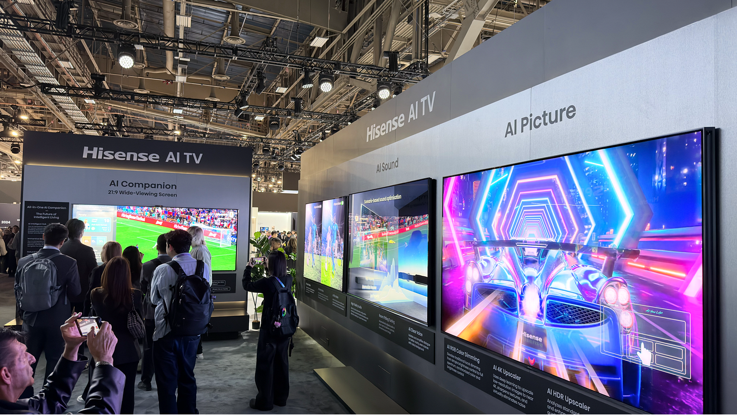 People looking at a display of televisions

AI-generated content may be incorrect.