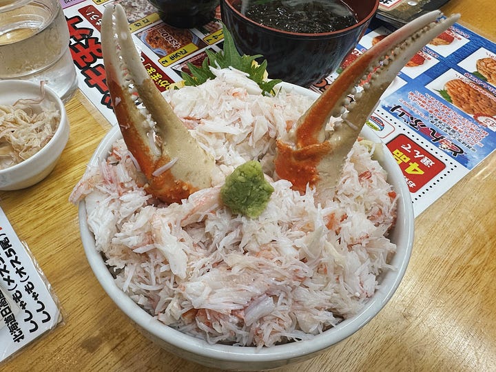 Scenes from Otaru, including a bowl of Hokkaido crab, the historic canal, handblown glassware, and the Otaru Music Box Museum
