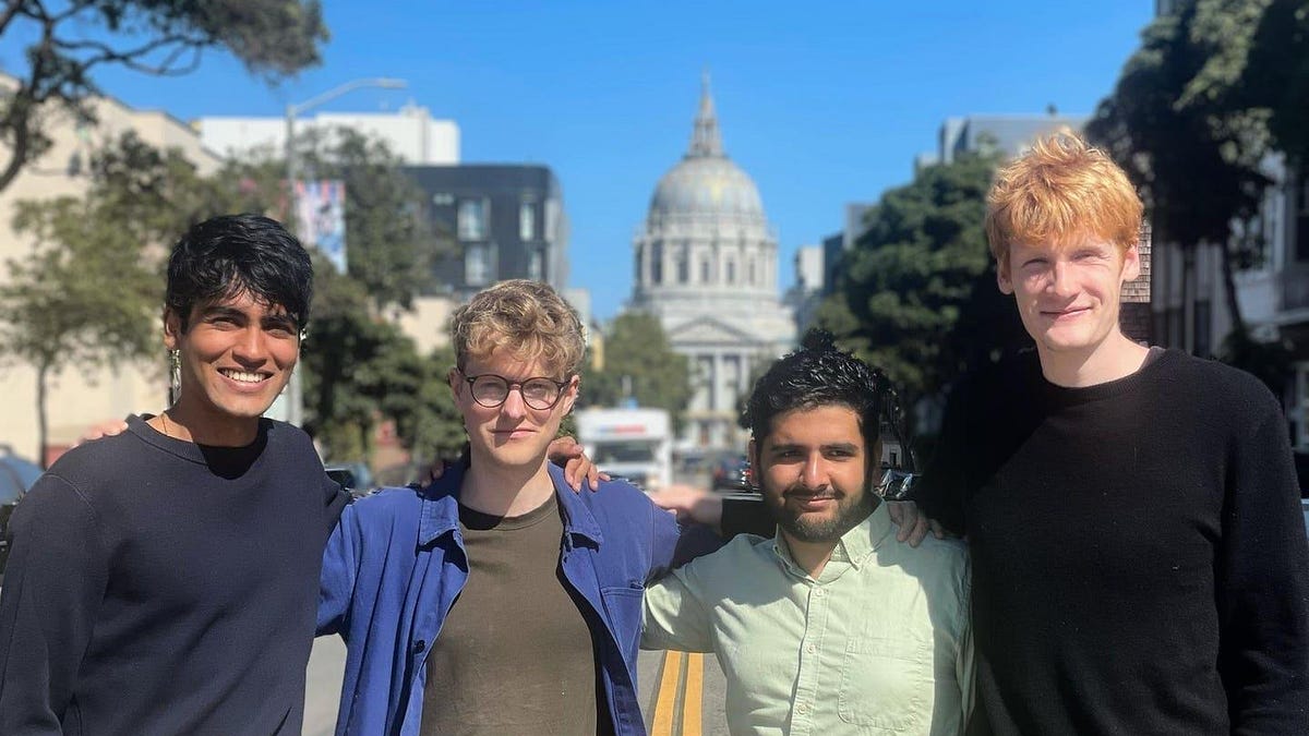 Cursor AI interface with autonomous agents reviewing code and automations running