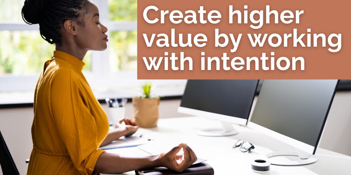 A calm, focused professional in a bold gold dress sits in stillness at her desk. Two monitors. No notifications. Just boundaries. Just breath.